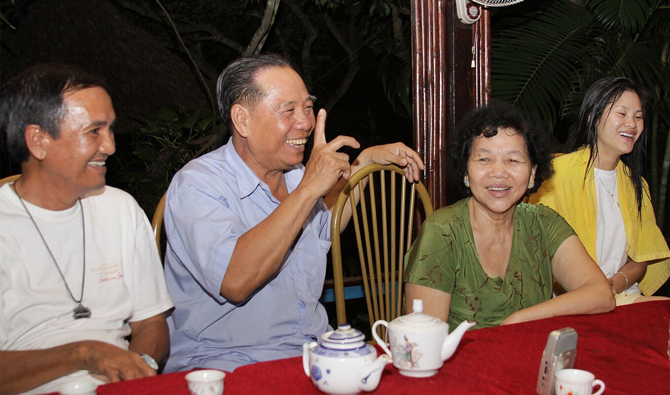 Song, Tam Tien, Madame Tam and Ngo break out in laughter